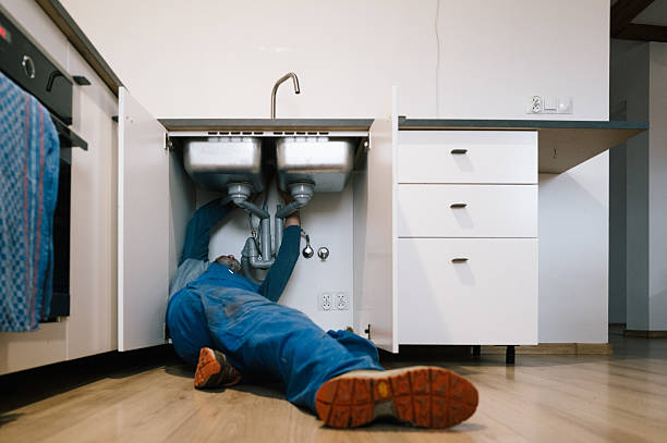 Professional Drain Cleaning technician working in Cameron, MO